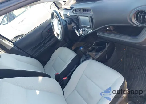 2016 Toyota Prius C One from USA, damaged, VIN JTDKDTB31G1134946